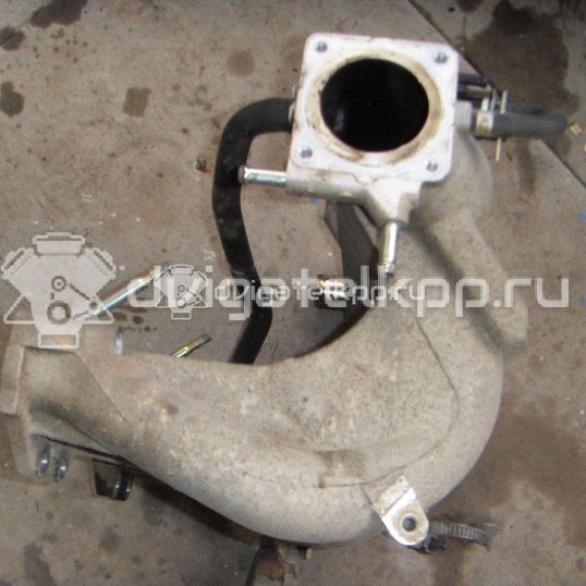 Фото Коллектор впускной для двигателя QG16DE для Nissan Primera / Almera 102-120 л.с 16V 1.6 л бензин 1400395F0B