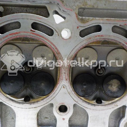 Фото Головка блока для двигателя CJZA для Volkswagen Golf 105 л.с 16V 1.2 л бензин 04E103264