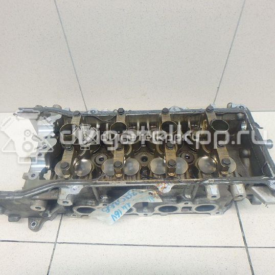 Фото Головка блока для двигателя CR14DE для Nissan Note / Micra 88-98 л.с 16V 1.4 л бензин 11040BC00A