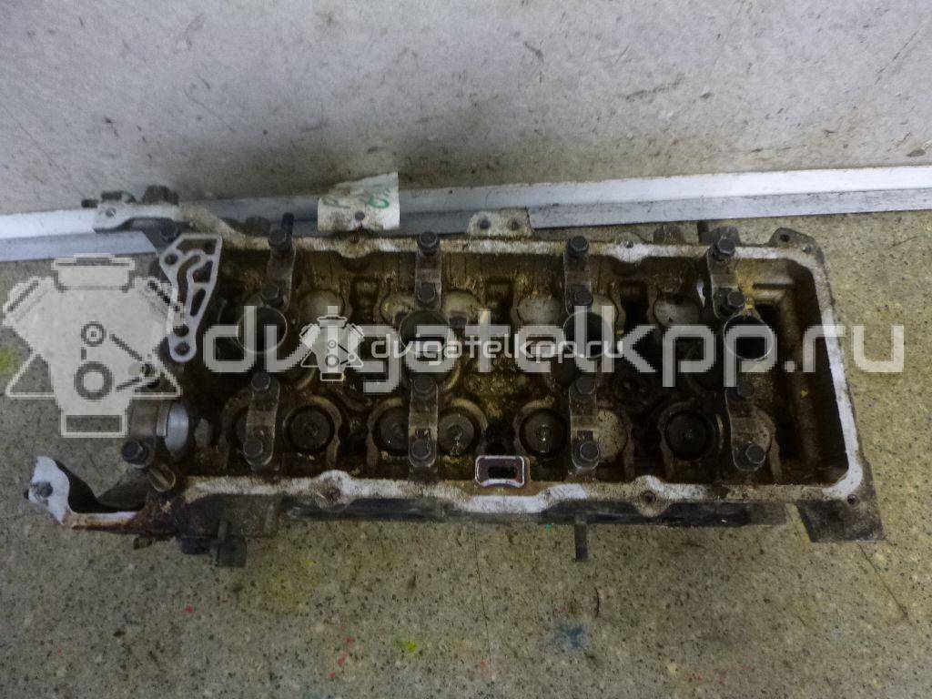 Фото Головка блока для двигателя QG18DE для Nissan Primera / Almera 106-128 л.с 16V 1.8 л бензин 11040AU310 {forloop.counter}}