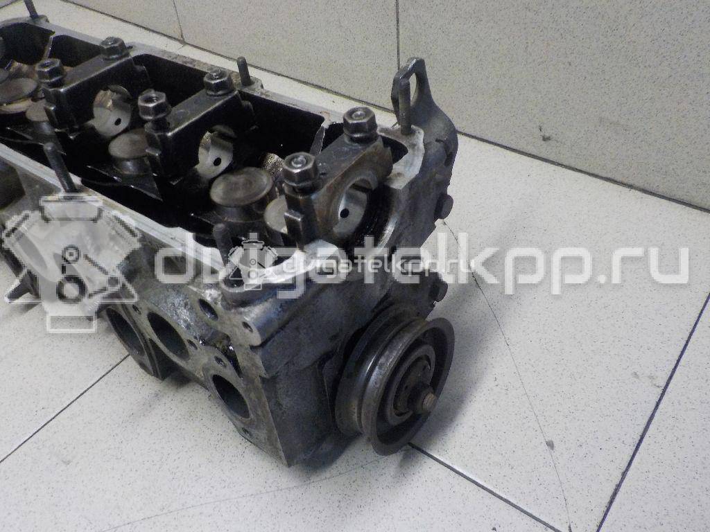 Фото Головка блока для двигателя AAM для Volkswagen Passat / Vento 1H2 / Golf 75 л.с 8V 1.8 л бензин 026103351Q {forloop.counter}}