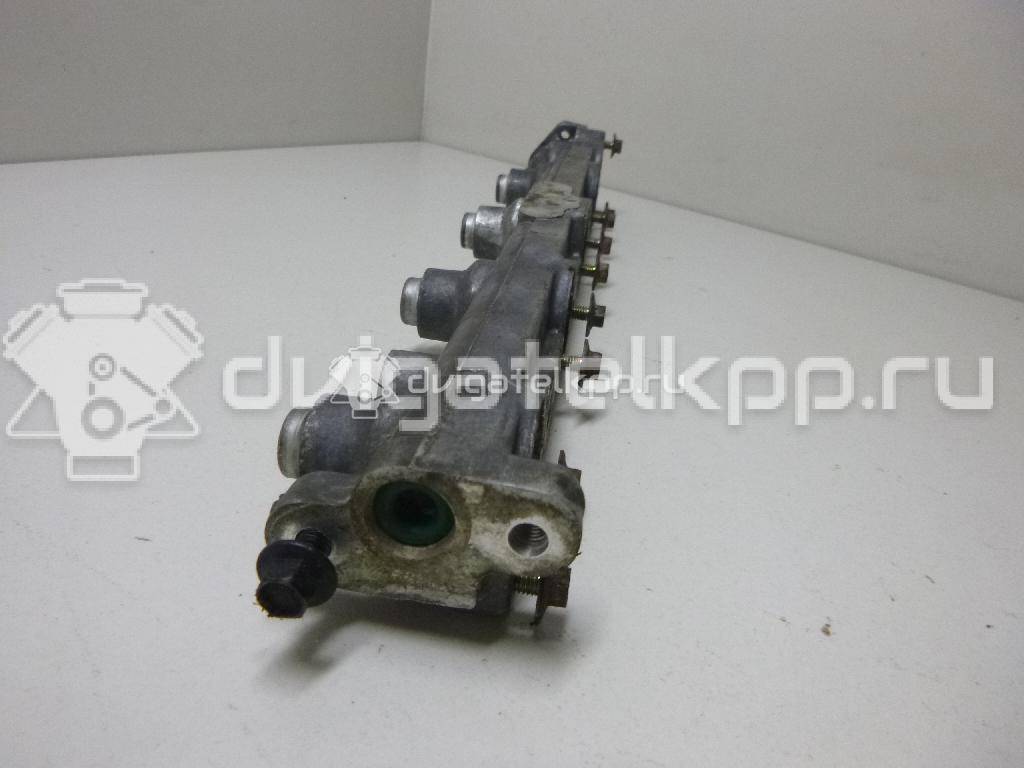 Фото Рейка топливная (рампа) для двигателя BP (DOHC) для Mazda / Ford Australia / Eunos 125-130 л.с 16V 1.8 л бензин 1077690 {forloop.counter}}