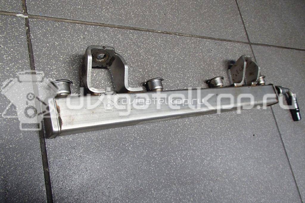 Фото Рейка топливная (рампа) для двигателя BP (DOHC) для Mazda / Ford Australia / Eunos 125-130 л.с 16V 1.8 л бензин 1438753 {forloop.counter}}