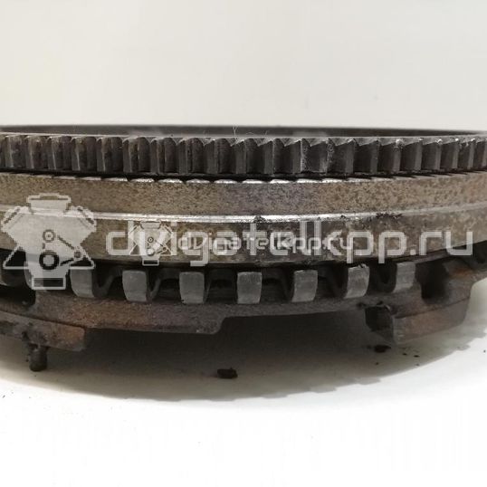 Фото Маховик для двигателя D4CB для Hyundai / Kia 140 л.с 16V 2.5 л Дизельное топливо 232004A100