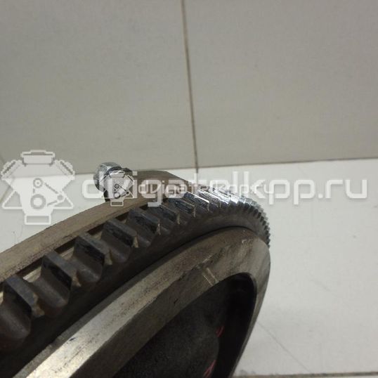 Фото Маховик для двигателя G4GC для Hyundai (Beijing) / Hyundai / Kia 137-141 л.с 16V 2.0 л бензин 2320023810