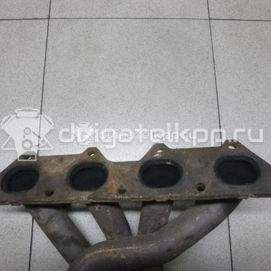 Фото Коллектор выпускной  MR323585 для mitsubishi Carisma (DA)