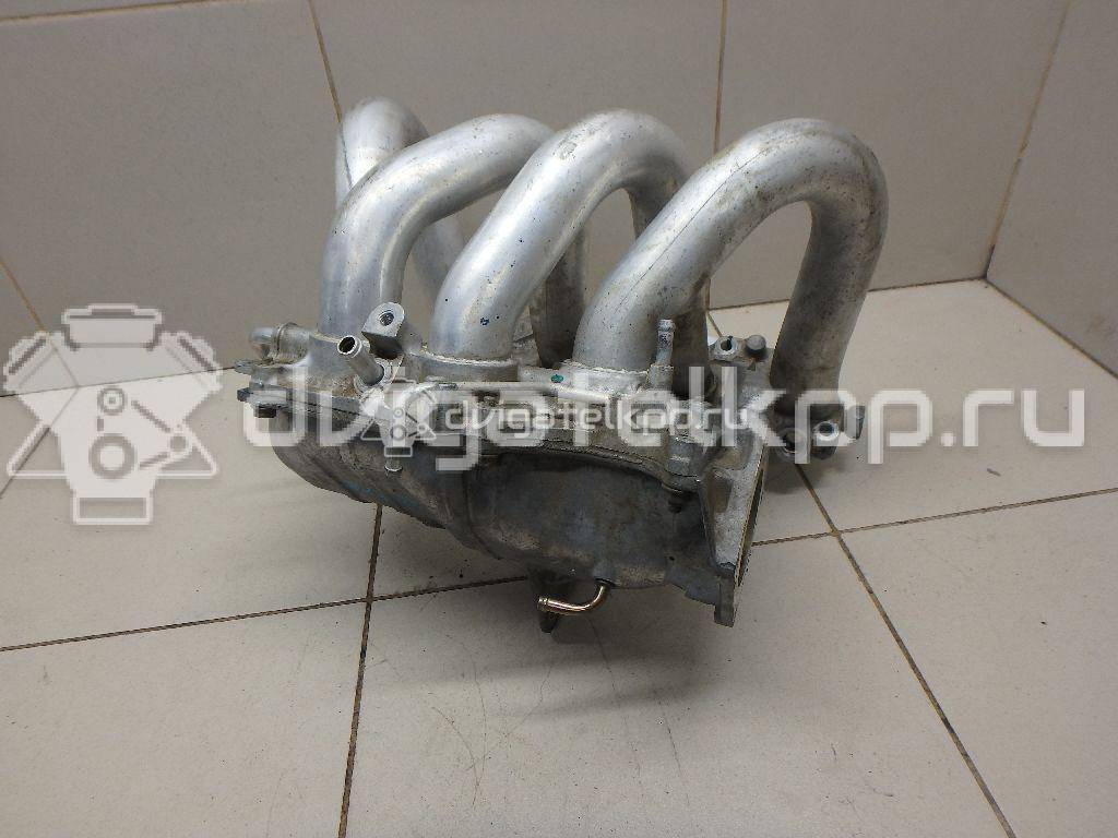 Фото Коллектор впускной для двигателя QG16DE для Nissan Sunny / Bluebird / Avenir / Primera / Almera 102-120 л.с 16V 1.6 л бензин 14010AU300 {forloop.counter}}