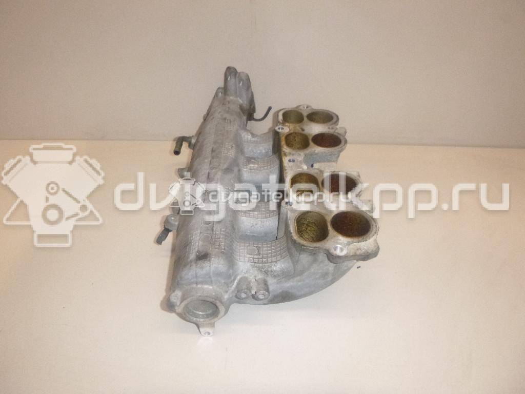 Фото Коллектор впускной для двигателя QR25DE для Nissan (Dongfeng) / Suzuki / Mitsuoka / Nissan 147-186 л.с 16V 2.5 л бензин 14010AE001 {forloop.counter}}