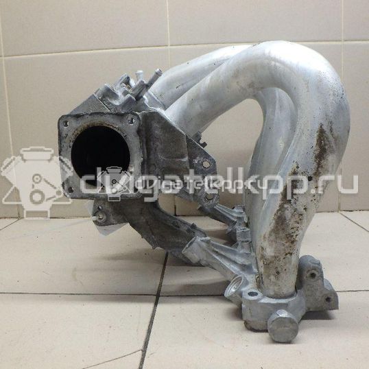 Фото Коллектор впускной для двигателя QG16DE для Nissan Sunny / Bluebird / Avenir / Primera / Almera 102-120 л.с 16V 1.6 л бензин 14010AU300