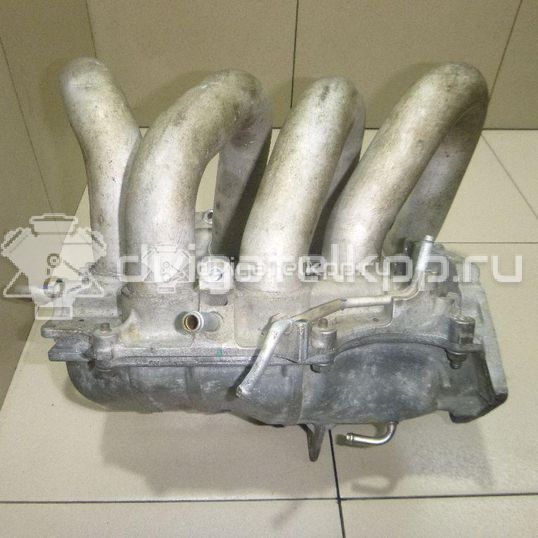 Фото Коллектор впускной для двигателя QG16DE для Nissan Sunny / Bluebird / Avenir / Primera / Almera 102-120 л.с 16V 1.6 л бензин 14010AU300