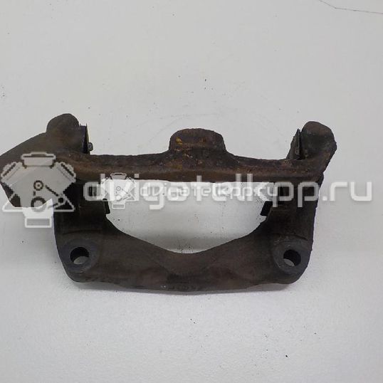 Фото Скоба суппорта переднего левого  7701047928 для Renault Safrane B54 / Megane / Clio / Laguna / Scénic