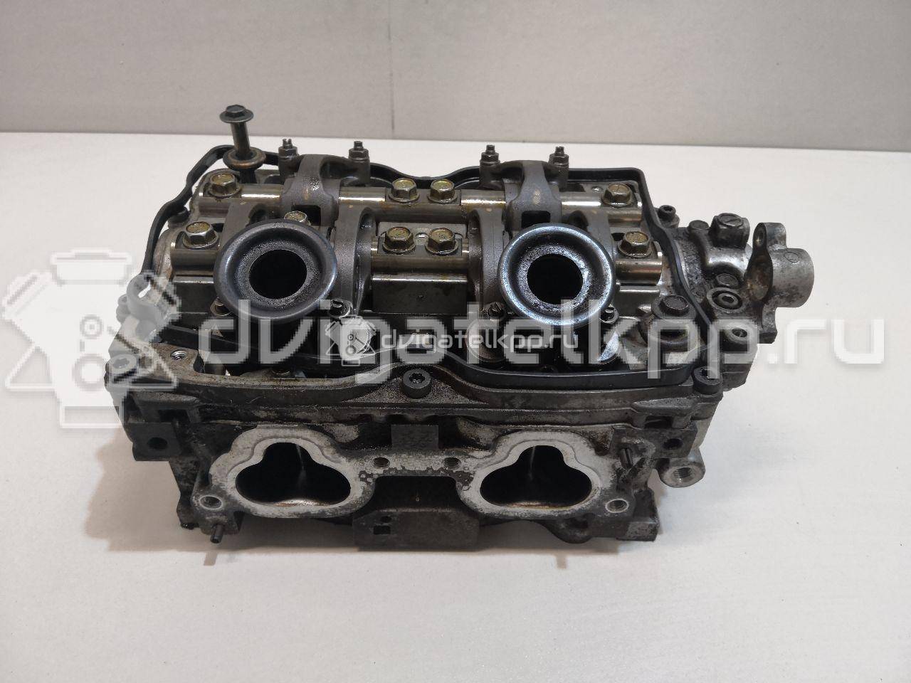 Фото Головка блока для двигателя EJ201 для Subaru / Chevrolet 115-148 л.с 16V 2.0 л бензин 11063AA910 {forloop.counter}}