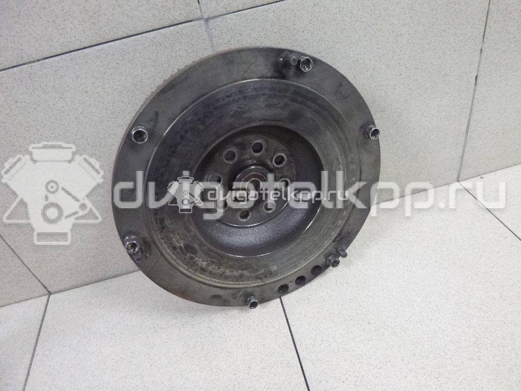 Фото Маховик для двигателя J20A для Maruti Suzuki / Suzuki / Chevrolet / Geo / Maruti 122 л.с 16V 2.0 л бензин 1262077EA0 {forloop.counter}}