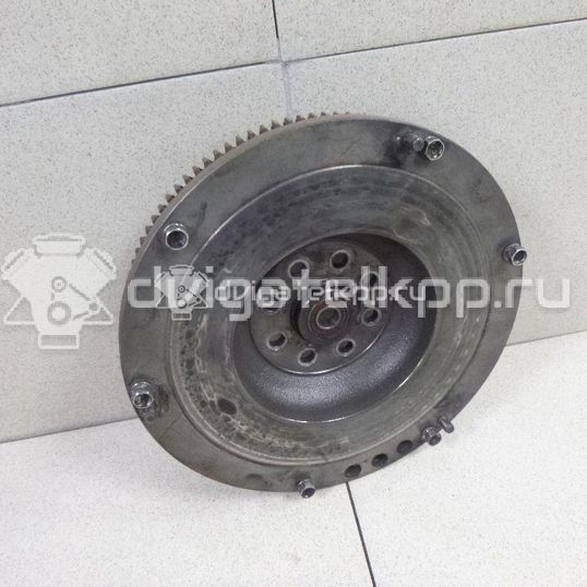 Фото Маховик для двигателя J20A для Maruti Suzuki / Suzuki / Chevrolet / Geo / Maruti 128-132 л.с 16V 2.0 л бензин 1262077EA0