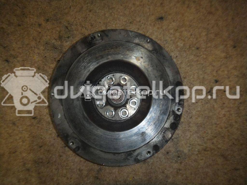 Фото Маховик для двигателя J20A для Maruti Suzuki / Suzuki / Chevrolet / Geo / Maruti 122 л.с 16V 2.0 л бензин 1262077EA0 {forloop.counter}}