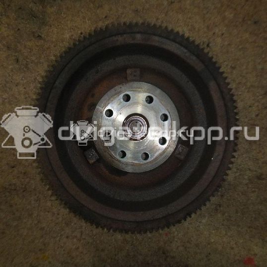 Фото Маховик для двигателя J20A для Maruti Suzuki / Suzuki / Chevrolet / Geo / Maruti 128-132 л.с 16V 2.0 л бензин 1262077EA0