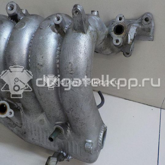 Фото Коллектор впускной для двигателя J20A для Maruti Suzuki / Suzuki / Chevrolet / Geo / Maruti 122 л.с 16V 2.0 л бензин 1311065D20