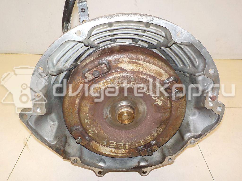 Фото Контрактная (б/у) АКПП для Jeep Commander Xk, Xh / Cherokee / Grand Cherokee 201-214 л.с 12V 3.7 л EKG бензин 05083914AA {forloop.counter}}