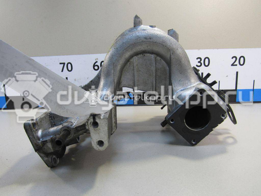 Фото Коллектор впускной для двигателя K6A для Suzuki / Mazda / Nissan 49-60 л.с 12V 0.7 л бензин 1311076JA1 {forloop.counter}}