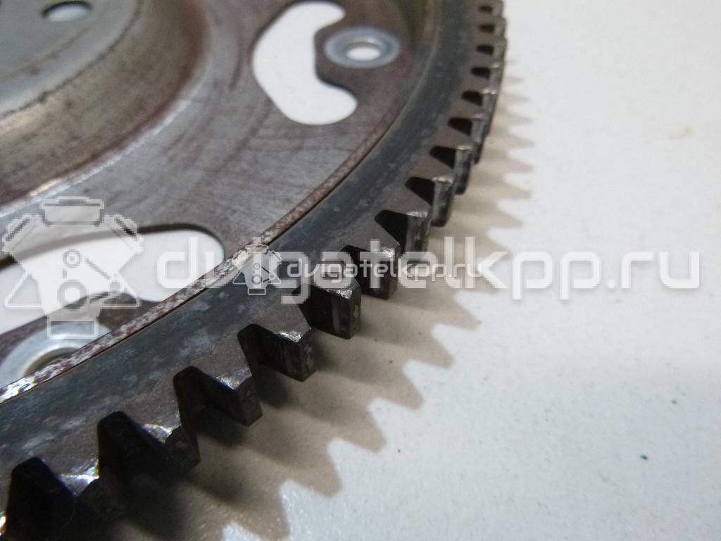 Фото Маховик для двигателя K12B для Opel / Suzuki / Mitsubishi / Vauxhall 86-94 л.с 16V 1.2 л бензин 2262073KR0 {forloop.counter}}