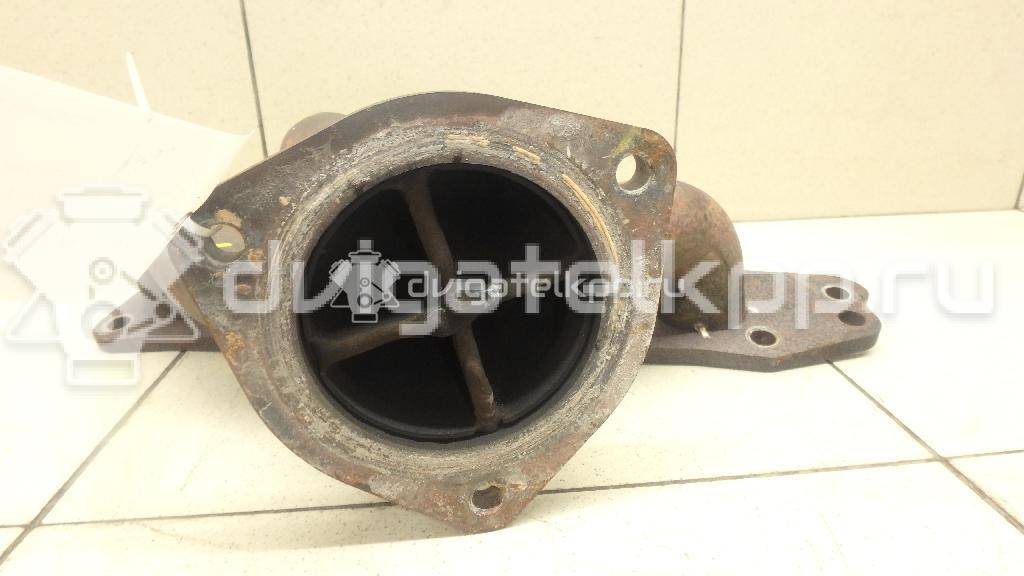 Фото Коллектор выпускной для двигателя J20A для Maruti Suzuki / Suzuki / Chevrolet / Geo / Maruti 128-132 л.с 16V 2.0 л бензин 1411080J01 {forloop.counter}}