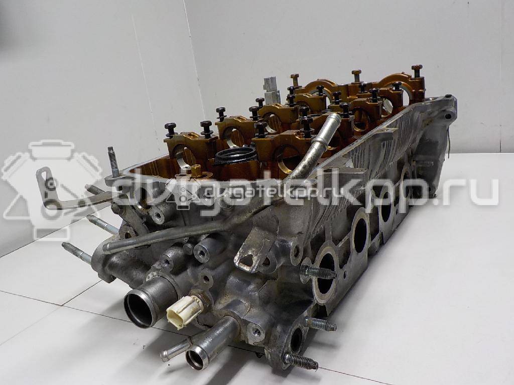 Фото Головка блока для двигателя 1NZ-FE для Subaru / Mitsuoka / Toyota 103-109 л.с 16V 1.5 л бензин 1110121033 {forloop.counter}}