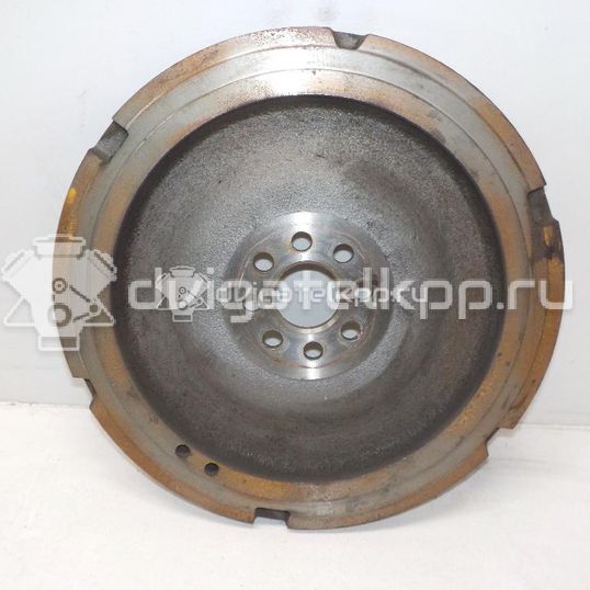 Фото Маховик для двигателя 1NR-FE для Daihatsu / Toyota 95-99 л.с 16V 1.3 л бензин 1340547020