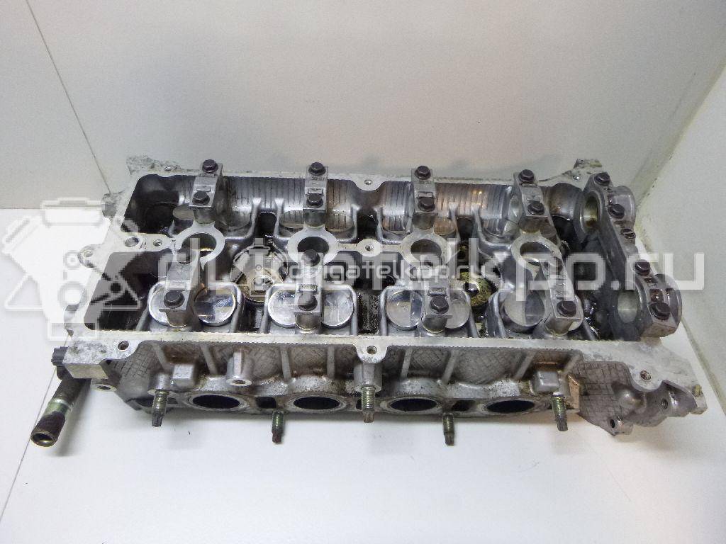 Фото Головка блока для двигателя B6 (DOHC) для Mazda Xedos / 323 107-109 л.с 16V 1.6 л бензин ZJ201001X {forloop.counter}}