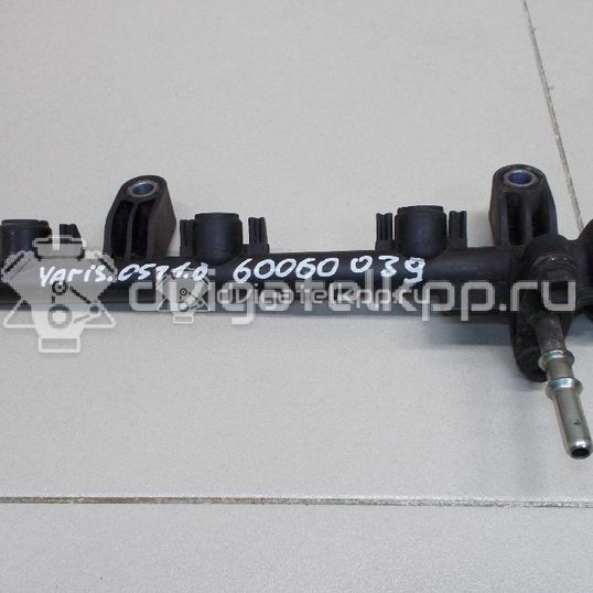 Фото Рейка топливная (рампа) для двигателя 1KR-FE для Subaru / Toyota / Daihatsu 68-70 л.с 12V 1.0 л бензин 238140Q010