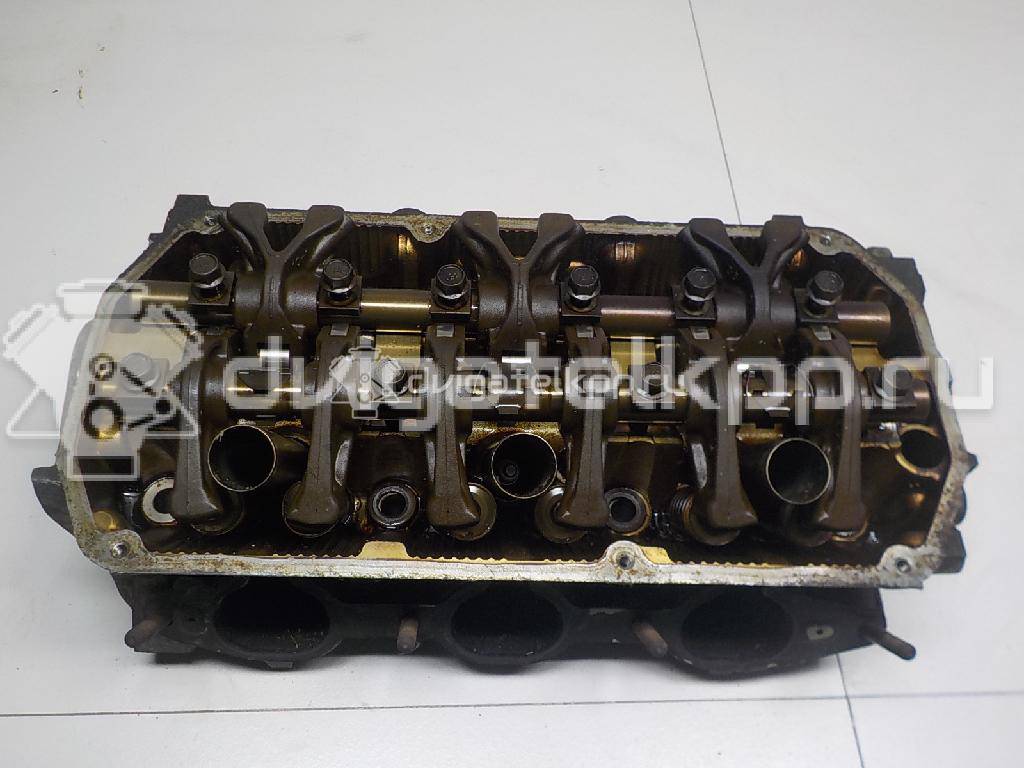 Фото Головка блока для двигателя 6G72 (DOHC 24V) для Mitsubishi Eclipse / Diamante / Galant / Pajero / L 143-286 л.с 24V 3.0 л бензин MD307678 {forloop.counter}}