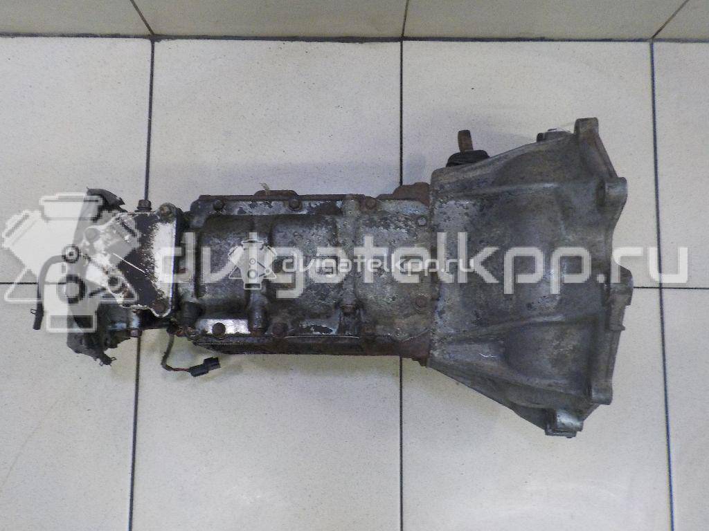 Фото Контрактная (б/у) МКПП для Mitsubishi Pajero 155-204 л.с 24V 3.0 л 6G72 (SOHC 24V) бензин {forloop.counter}}