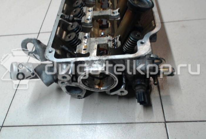 Фото Головка блока для двигателя 4G92 (DOHC 16V) для Mitsubishi Mirage 147-174 л.с 16V 1.6 л бензин MD313416 {forloop.counter}}