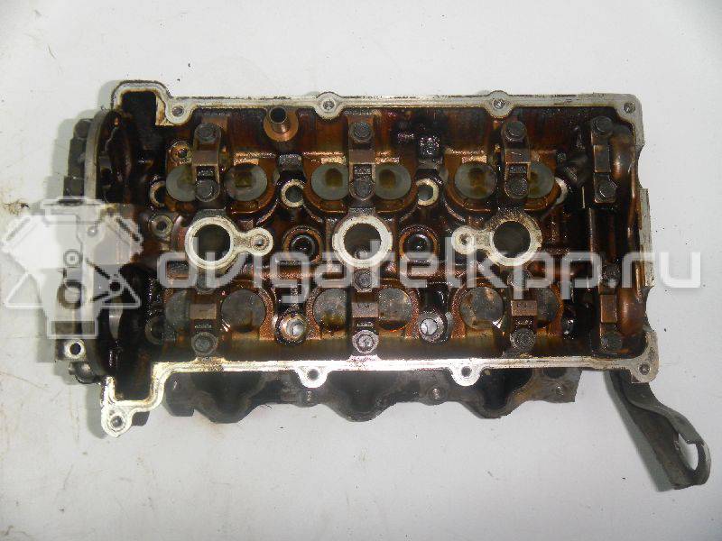 Фото Головка блока для двигателя KL для Mazda Xedos / Mx-6 / Mx-6 Ge / 626 163-167 л.с 24V 2.5 л бензин {forloop.counter}}