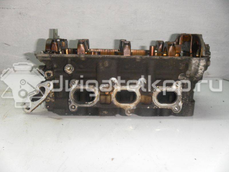 Фото Головка блока для двигателя KL для Mazda Xedos / Mx-6 / Mx-6 Ge / 626 163-167 л.с 24V 2.5 л бензин {forloop.counter}}