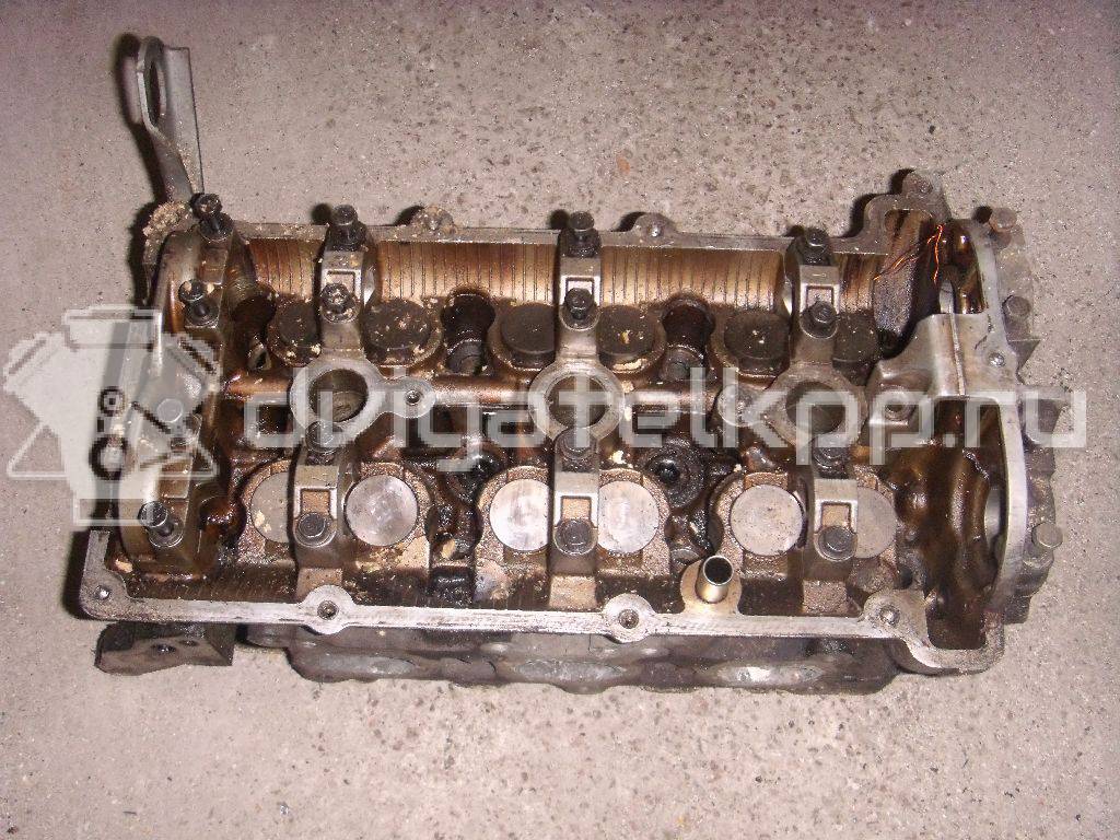 Фото Головка блока для двигателя KL для Mazda Xedos / Mx-6 / Mx-6 Ge / 626 163-167 л.с 24V 2.5 л бензин {forloop.counter}}