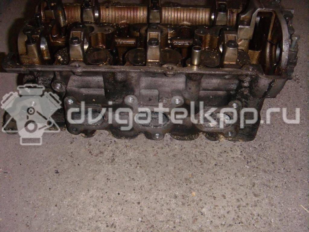 Фото Головка блока для двигателя B6 (DOHC) для Mazda Xedos / 323 107-109 л.с 16V 1.6 л бензин {forloop.counter}}