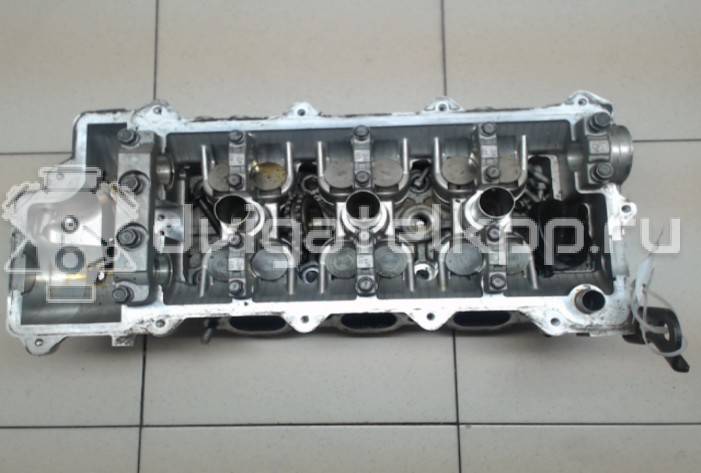 Фото Головка блока для двигателя G6EA для Hyundai / Kia 180-194 л.с 24V 2.7 л бензин {forloop.counter}}