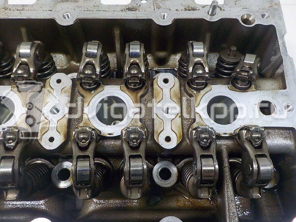 Фото Головка блока для двигателя CWVA для Volkswagen / Skoda / Seat 110 л.с 16V 1.6 л бензин 04E103065H {forloop.counter}}