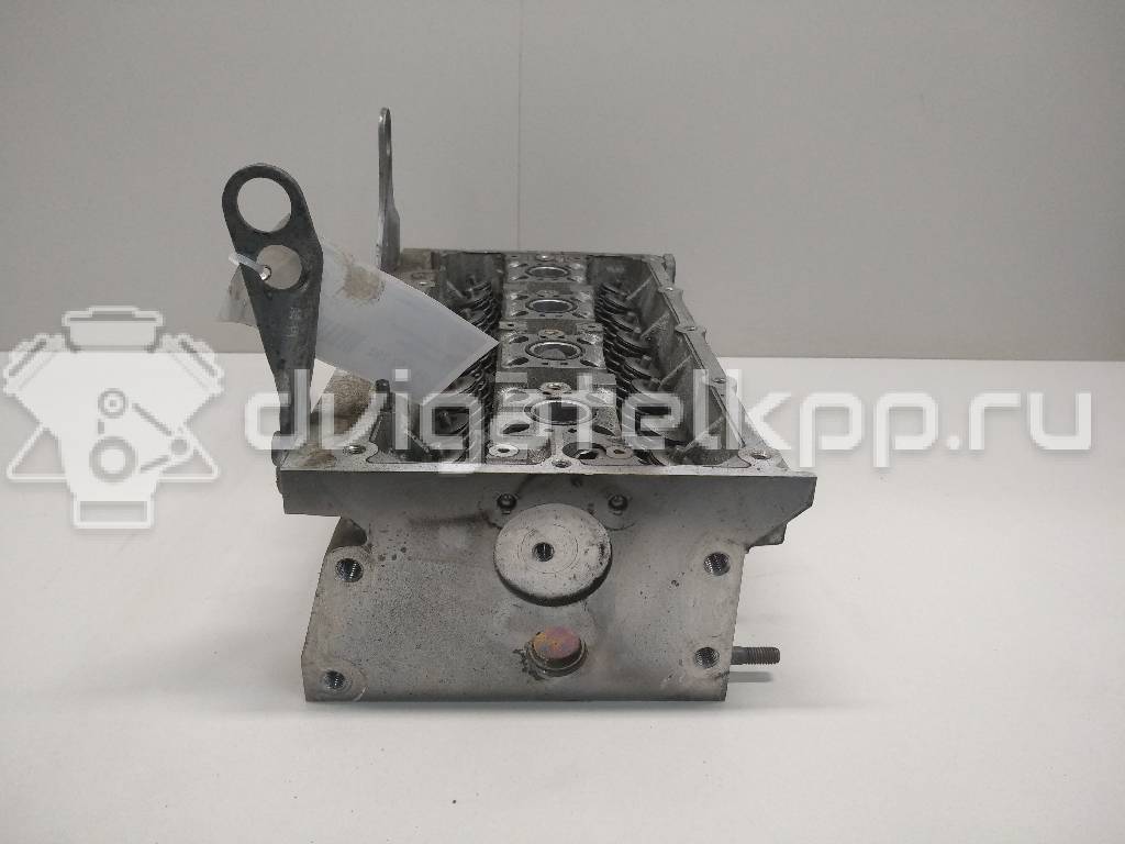 Фото Головка блока для двигателя BUD для Volkswagen / Skoda 80 л.с 16V 1.4 л бензин 036103351M {forloop.counter}}