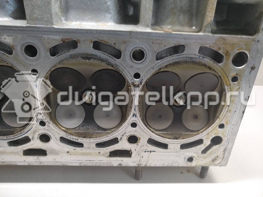 Фото Головка блока для двигателя BUD для Volkswagen / Skoda 80 л.с 16V 1.4 л бензин 036103351M {forloop.counter}}