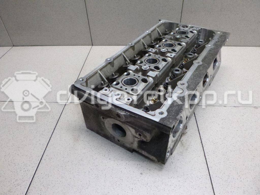 Фото Головка блока для двигателя BUD для Volkswagen / Skoda 80 л.с 16V 1.4 л бензин 036103351M {forloop.counter}}