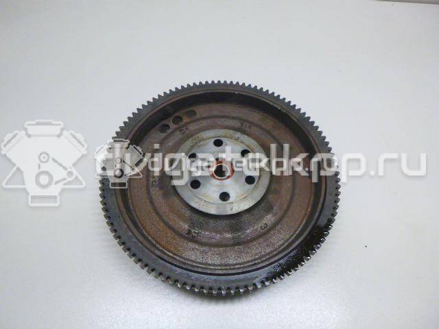 Фото Маховик для двигателя K12B для Suzuki / Mitsubishi / Vauxhall 86-94 л.с 16V 1.2 л бензин 1262051K00 {forloop.counter}}