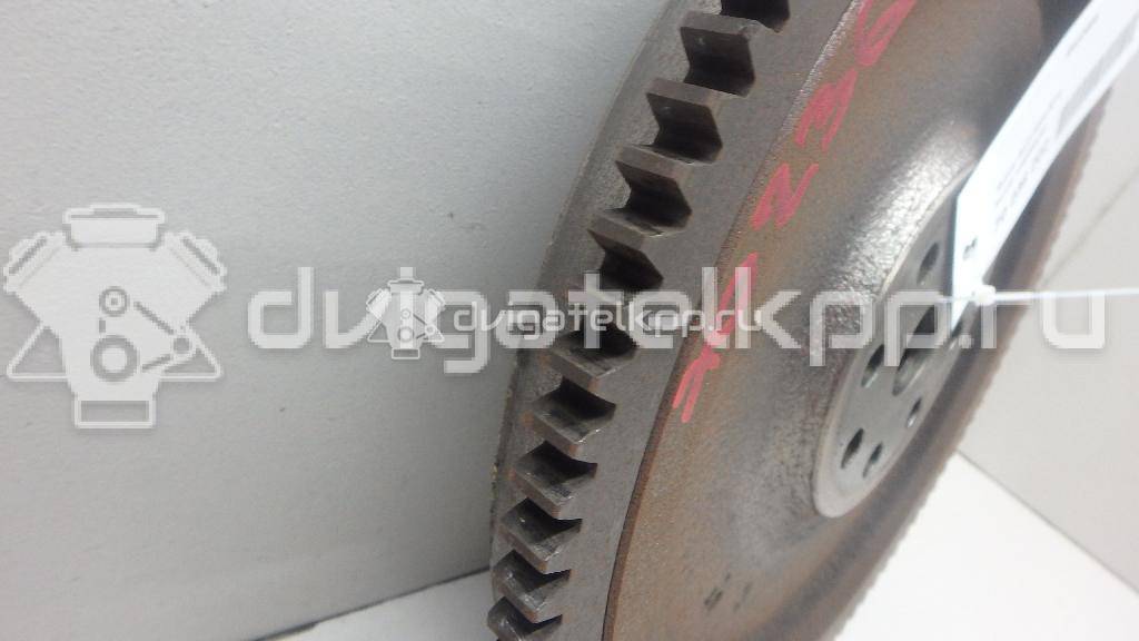 Фото Маховик для двигателя M13A для Suzuki / Chevrolet 82-94 л.с 16V 1.3 л бензин 1262063J00 {forloop.counter}}