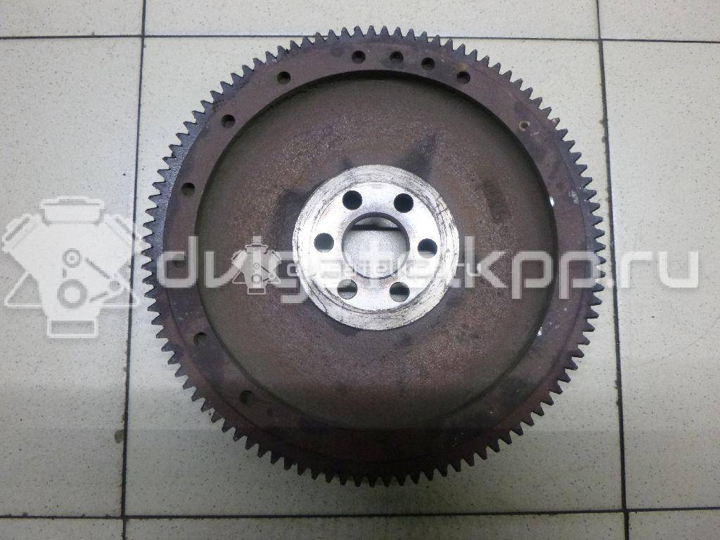 Фото Маховик для двигателя 1SZ-FE для Toyota Yaris / Platz Ncp1 , Scp1 65-68 л.с 16V 1.0 л бензин 1340523040 {forloop.counter}}