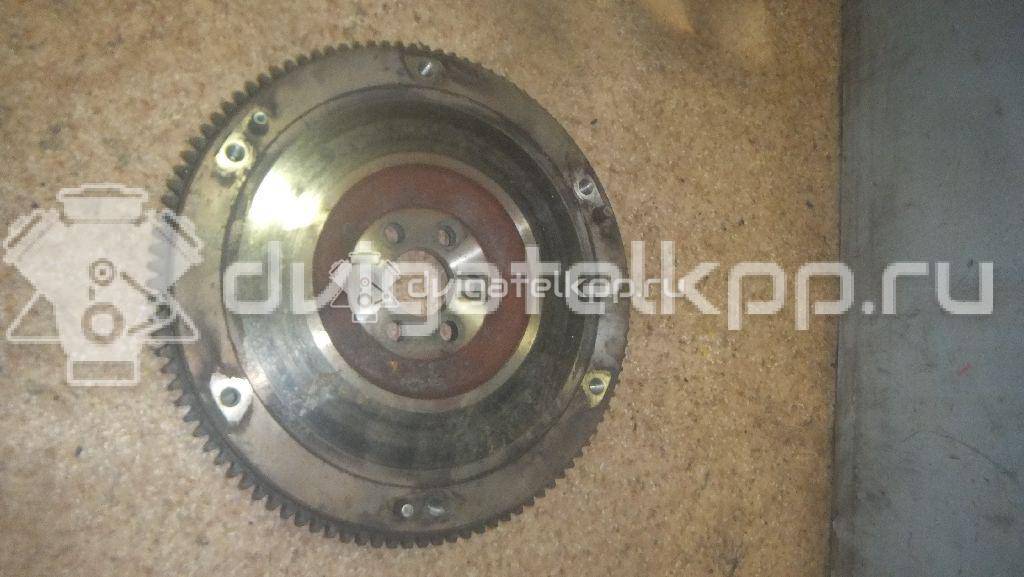 Фото Маховик для двигателя 1KR-FE для Subaru / Toyota / Daihatsu 65-71 л.с 12V 1.0 л бензин {forloop.counter}}