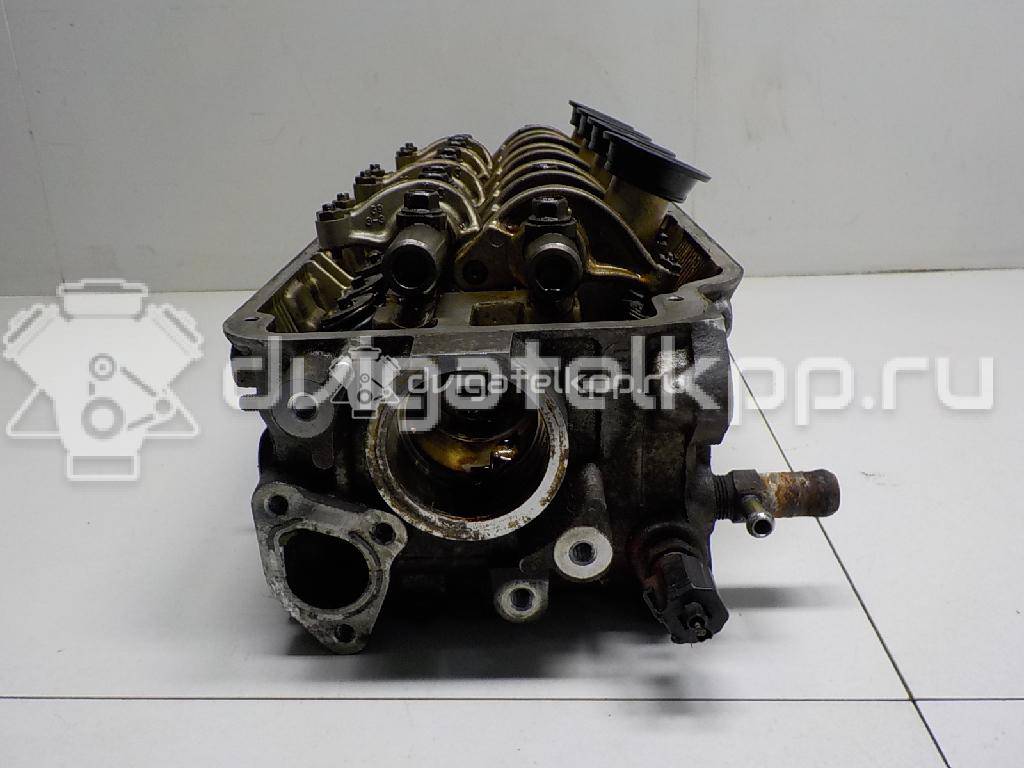 Фото Головка блока для двигателя 4G92 (DOHC 16V) для Mitsubishi Mirage 147-174 л.с 16V 1.6 л бензин {forloop.counter}}