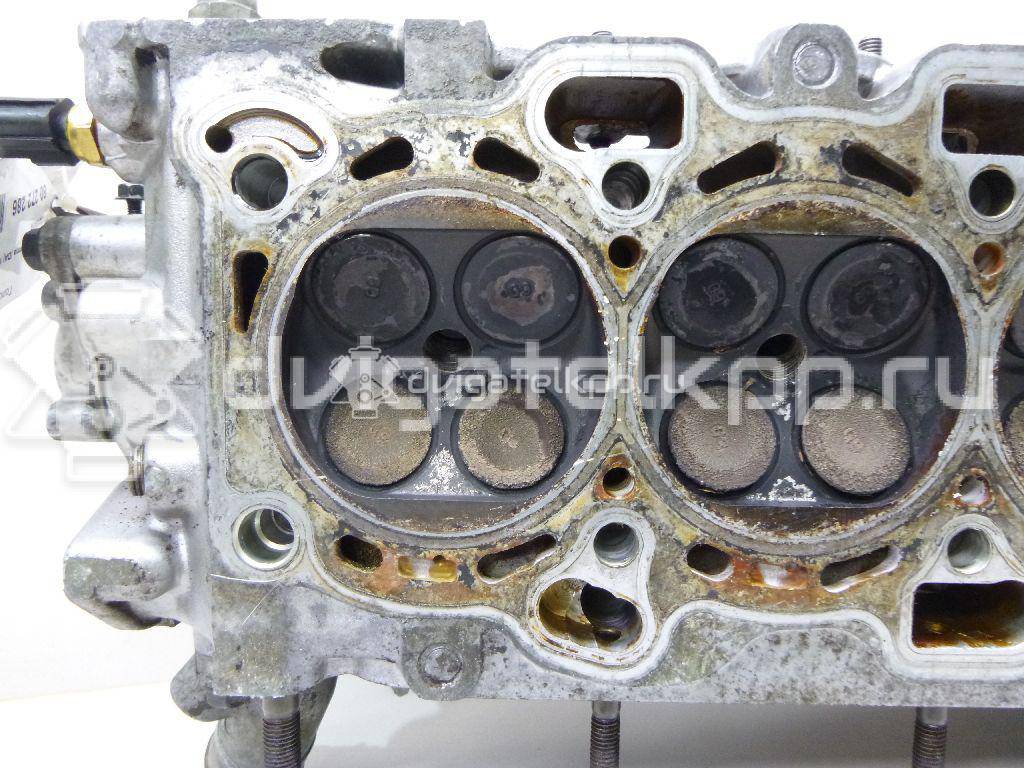 Фото Головка блока для двигателя 4G92 (DOHC 16V) для Mitsubishi Mirage 147-174 л.с 16V 1.6 л бензин {forloop.counter}}