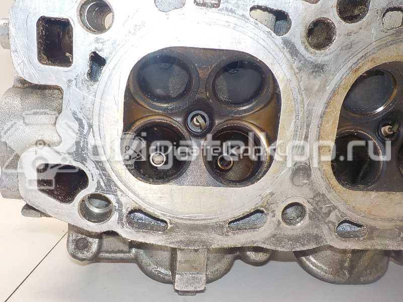 Фото Головка блока для двигателя 6G72 (DOHC 24V) для Mitsubishi Eclipse / Diamante / Galant / Pajero / L 143-286 л.с 24V 3.0 л бензин MD307677 {forloop.counter}}