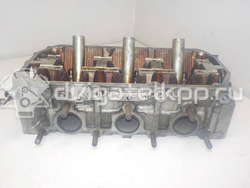 Фото Головка блока для двигателя 6G72 (DOHC 24V) для Mitsubishi Eclipse / Diamante / Galant / Pajero / L 143-286 л.с 24V 3.0 л бензин MD307677 {forloop.counter}}