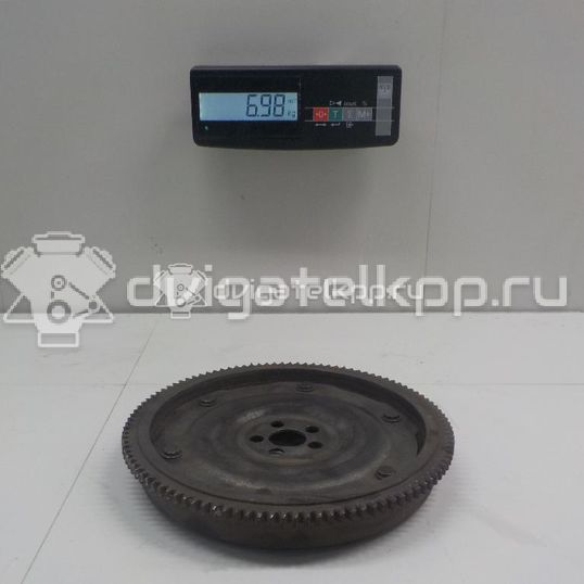 Фото Маховик для двигателя 4G13 (12V) для Mitsubishi Colt / Mirage / Lancer 60-79 л.с 12V 1.3 л бензин MD341315